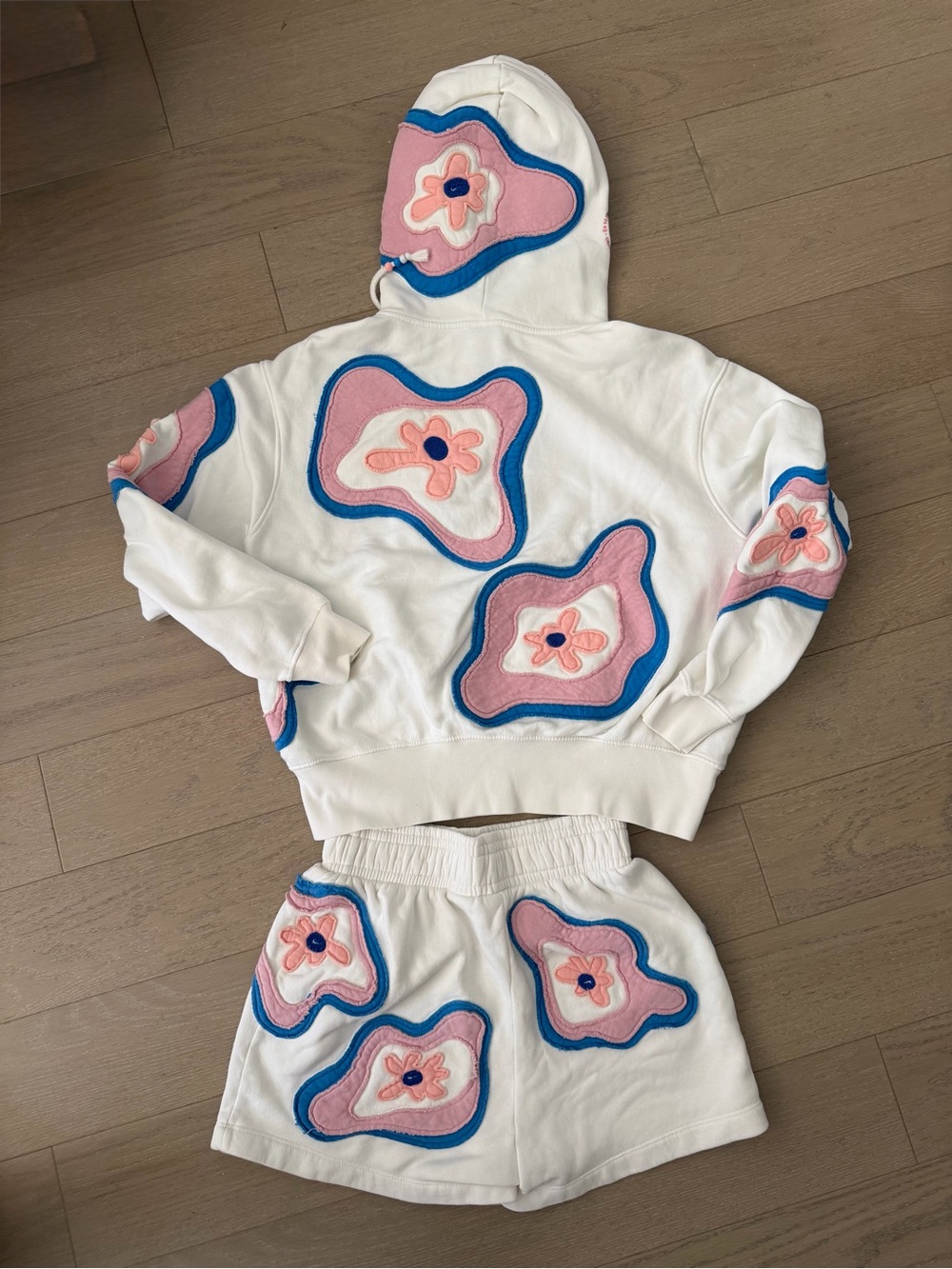 Nike White Athletic Shorts with Pink and Blue Floral Appliqués - Picture 3 of 8